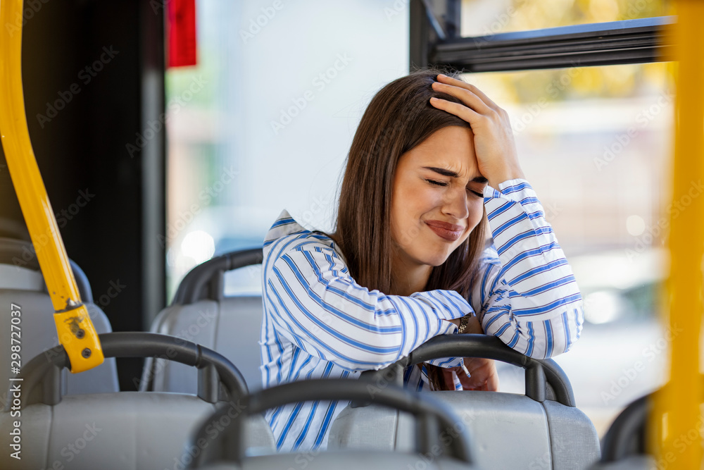 Displeased Young Woman Riding In The Bus Young Sad Woman On A Bus Displeased Young Woman Riding In The Bus Young Sad Woman On A Bus