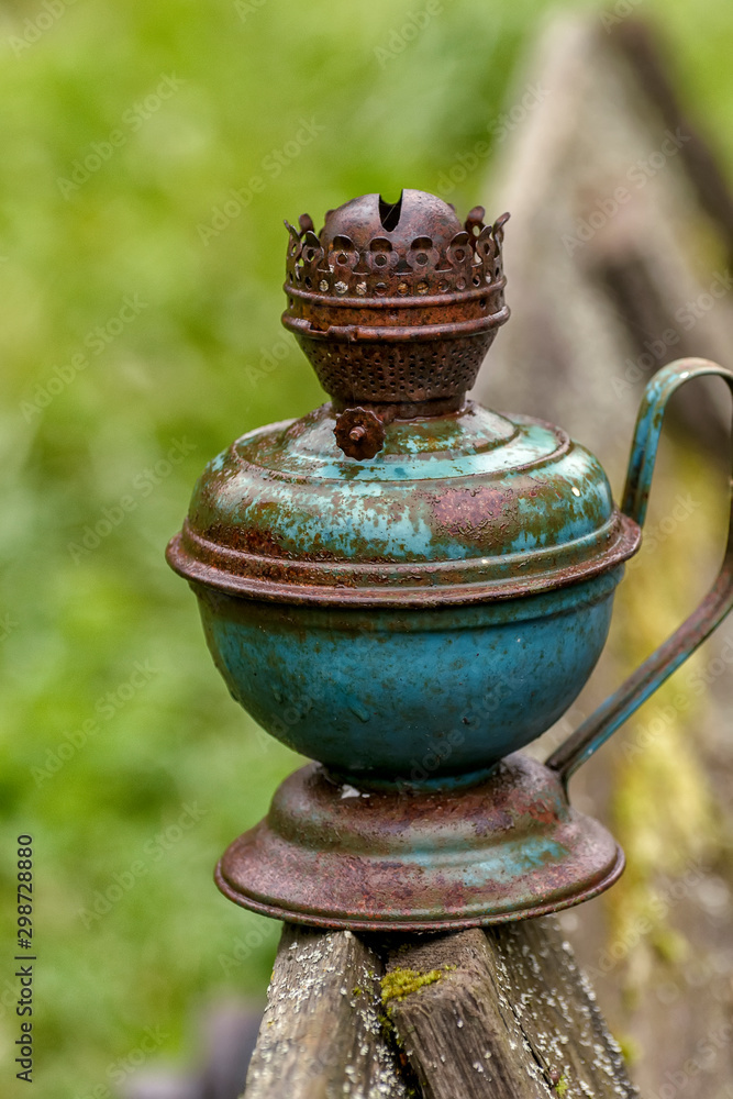 An old kerosene lamp, out of use. An old kerosene lamp, out of use.