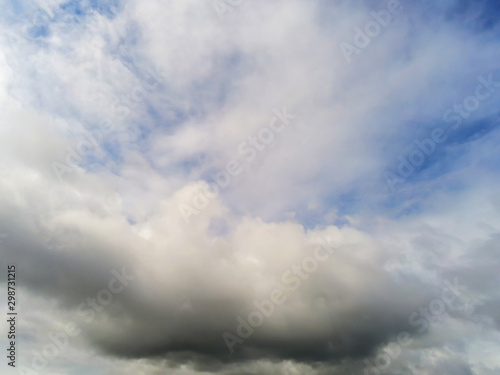 Blue cloudy sky, abstract nature background.