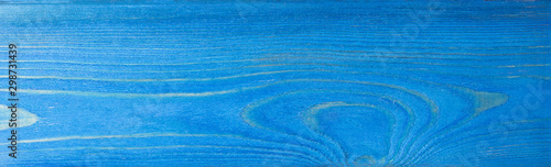 Wooden Board painted by blue paint. The texture of the wood, where you want to copy. Template subtext