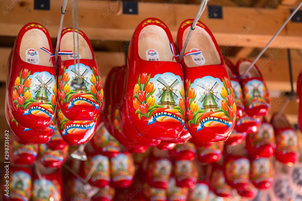 Keukenhof Lisse The Netherlands May 2018 Red wooden shoes for sale at a Dutch retail shop. Wooden clogs are a well known souvenirs from Holland Stock Photo Adobe Stock