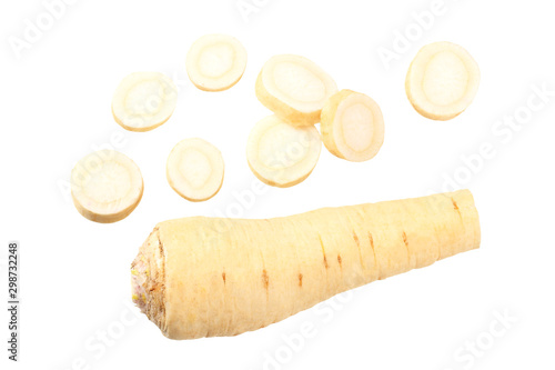 fresh parsley root with slices isolated on white background. top view