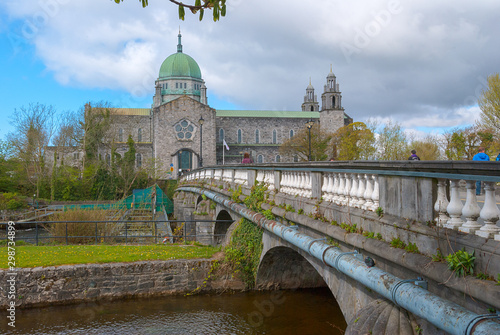 View of the facade of Galway Cathedral from the Corrib river bridge, Galway, Ireland