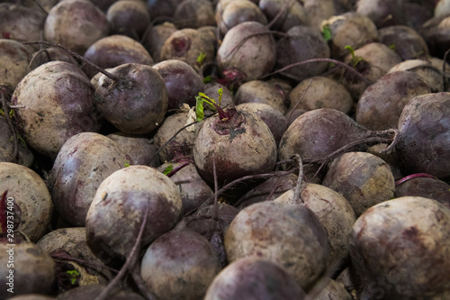 Fresh purple beets as a background