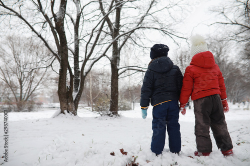 Children in winter park play