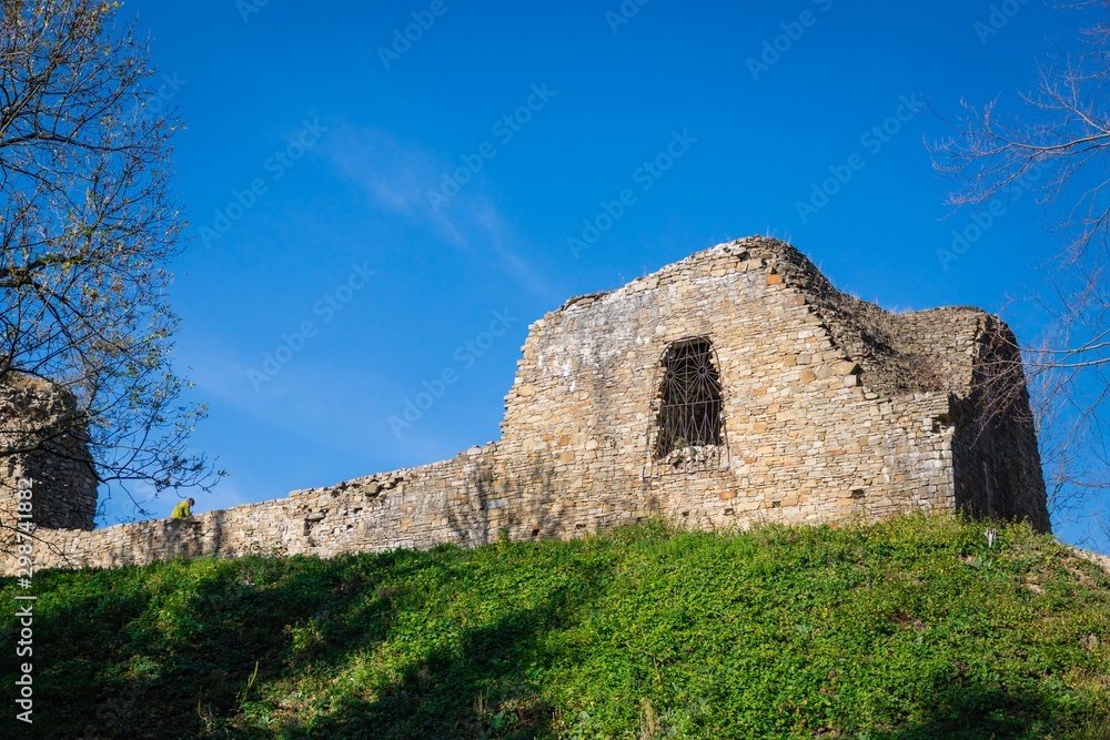 Ruins of the castle and blue sky. Lanckorona, Poland.