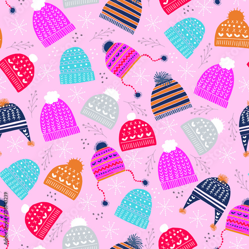 Fototapeta Naklejka Na Ścianę i Meble -  seasonal vector pattern repeat of hand-drawn, cheerful, winter, woolly hats
