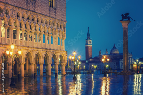 Piazza San Marco at night, view on venetian lion and san giorgio maggiore, Vinice, Italy