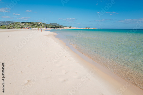 Fototapeta Naklejka Na Ścianę i Meble -  CHIA, SARDINIA / OCTOBER 2019: The beautiful white sand beach of Chia, south of Sardinia