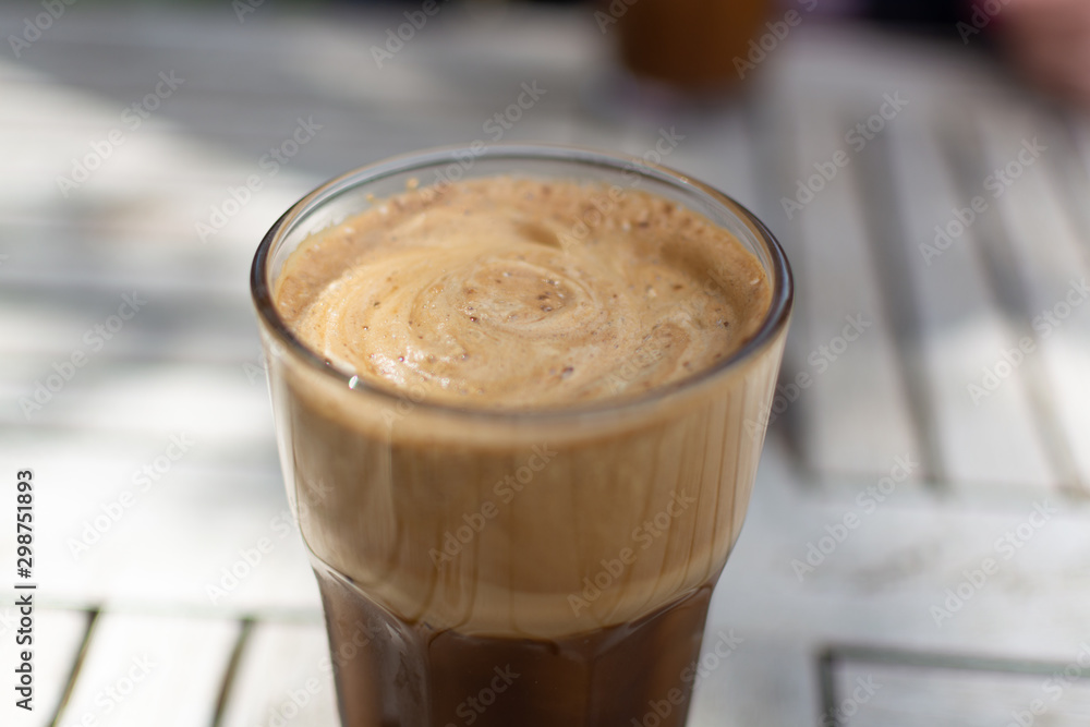 Traditional greek cold coffee Frappe made from water, instant coffee and ice cubes Traditional greek cold coffee Frappe made from water, instant coffee and ice cubes