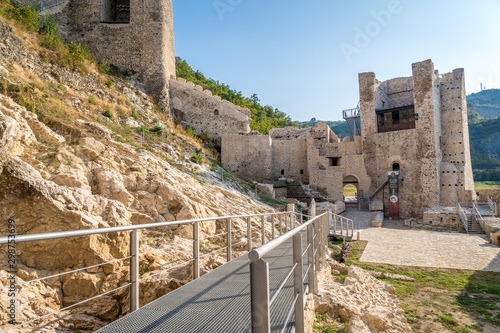 Summer afternoon view of restored medieval Golubac fortress, trdava Golubac  on the bank of the Danube in Serbia for Yugoslavia across from Romania major tourist destination photo