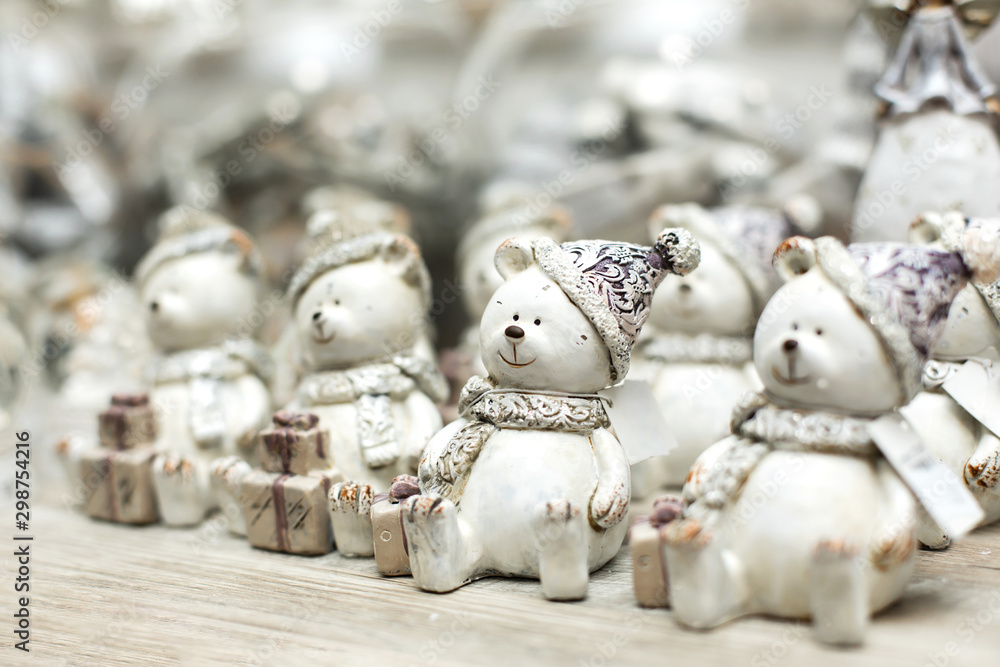 holiday christmas decoration. Shelf with figures of toy white bears. Little things that create a Christmas mood.