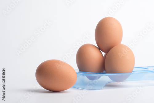 Fresh eggs on a white background
