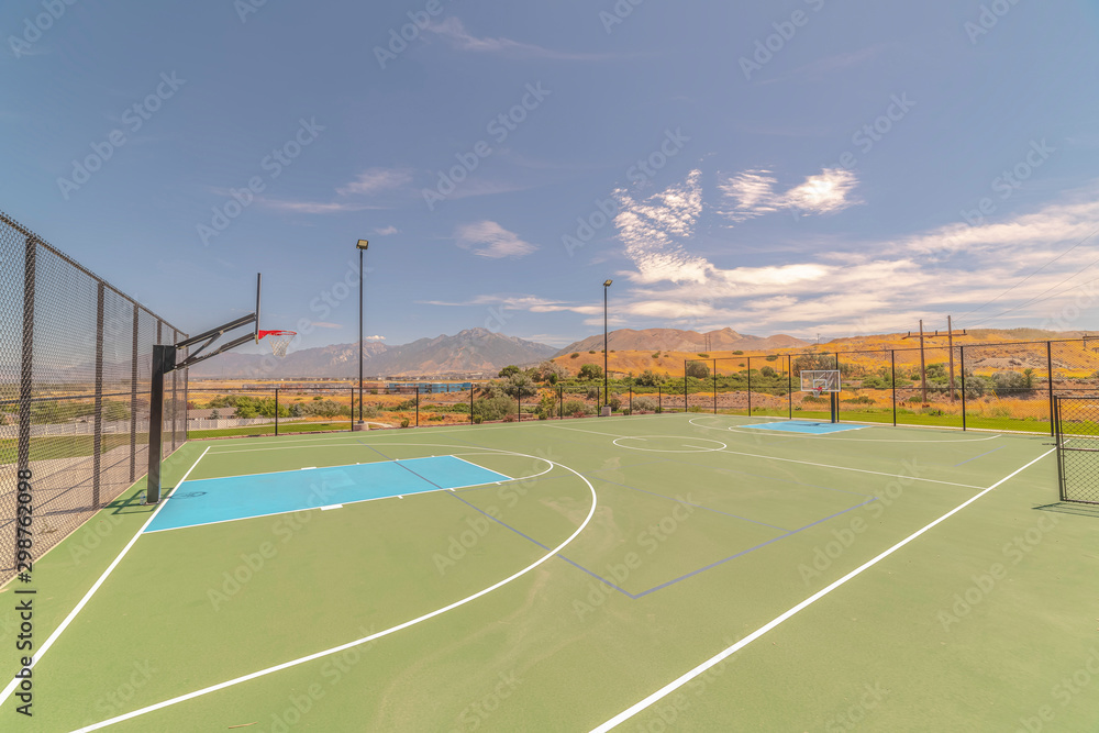 Outdoor turf basketball court on sunny, clear day