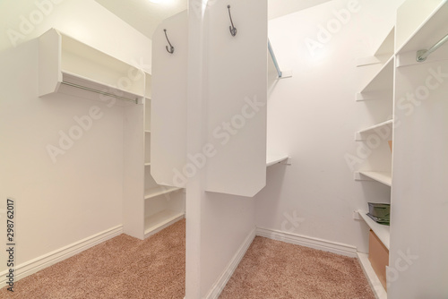 Interior of a dual walk in wardrobe