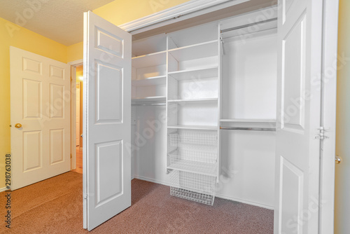 Fotografia, Obraz Empty white built in closet or wardrobe interior