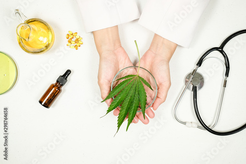 cbd thc oil medical treatment in doctor laboratory. natural medicine on clinical research . photo