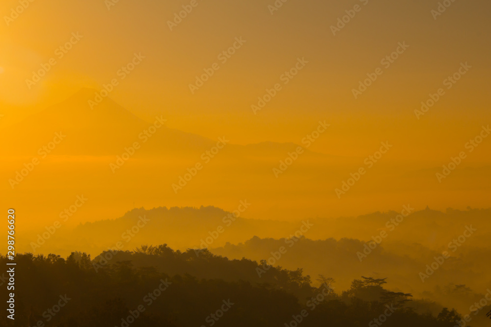 Misty sunrise over a valley