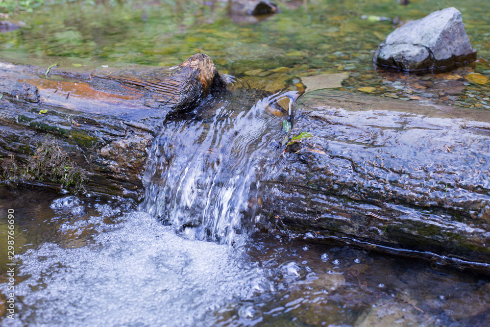 Mountain river scenery in the middle of green forest Mountain river scenery in the middle of green forest