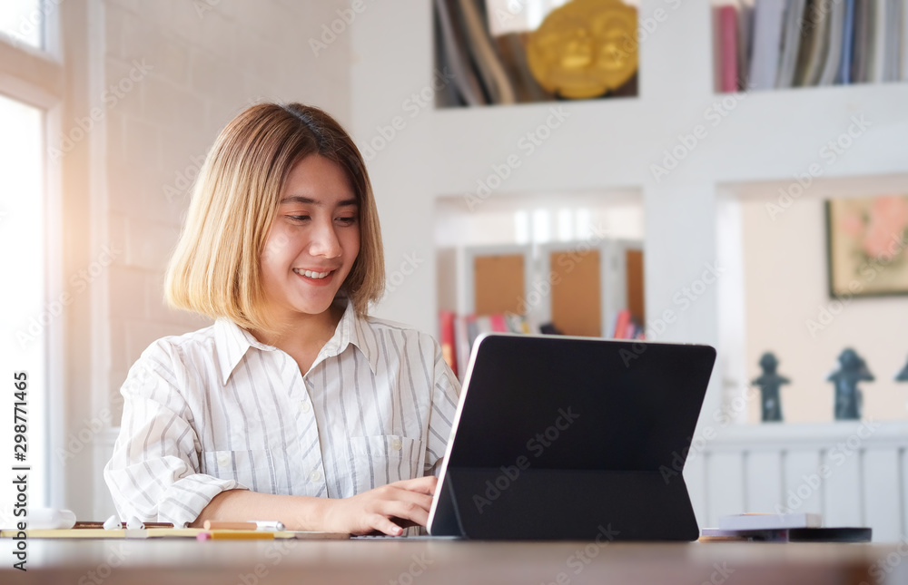 Business women working in office room enjoying sunny morning on the day with documents and laptop people Consulting and business planning. Business women working in office room enjoying sunny morning on the day with documents and laptop people Consulting and business planning.