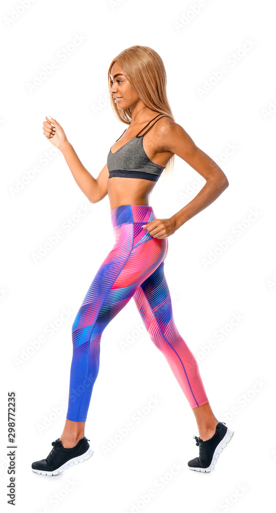 Sporty running African-American woman on white background Sporty running African-American woman on white background
