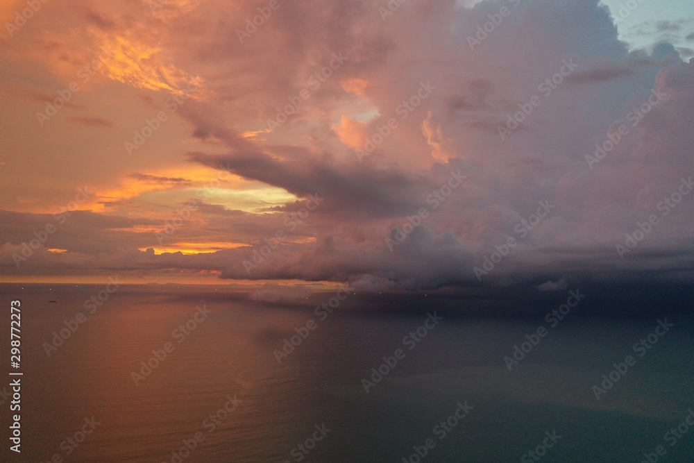 Storm at sunset over ocean 