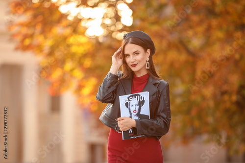 Stylish young woman outdoor...