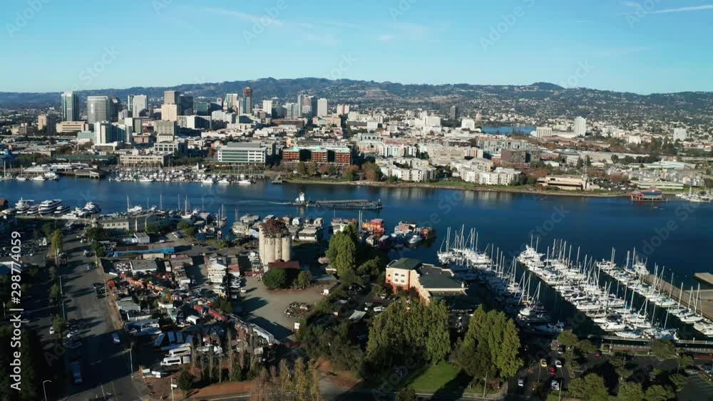 Tracking a large barge trolling through the estuary on a sunny afternoon in the bay area.