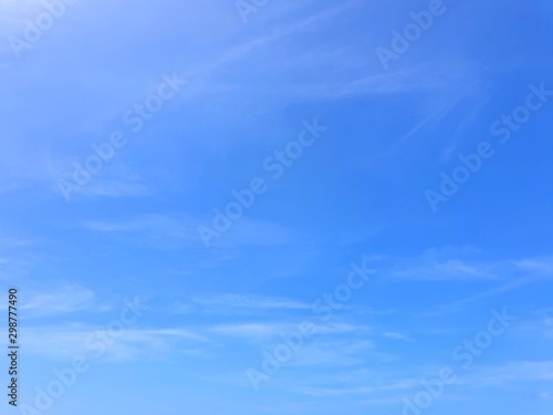 Beautiful nature of blue sky and clouds with the sun shining in the morning, sky background, cloudscape concept, Looking up