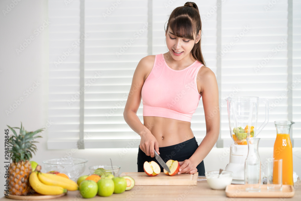 Asian girl prepare material for make a smoothie juice Asian girl prepare material for make a smoothie juice