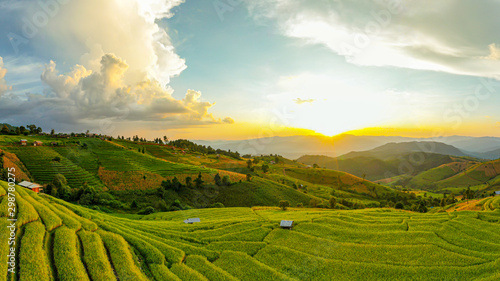 Panorama Aerial view Sunset scene of Pa Bong Piang terraced rice fields, Mae Chaem, Chiang Mai Thailand photo