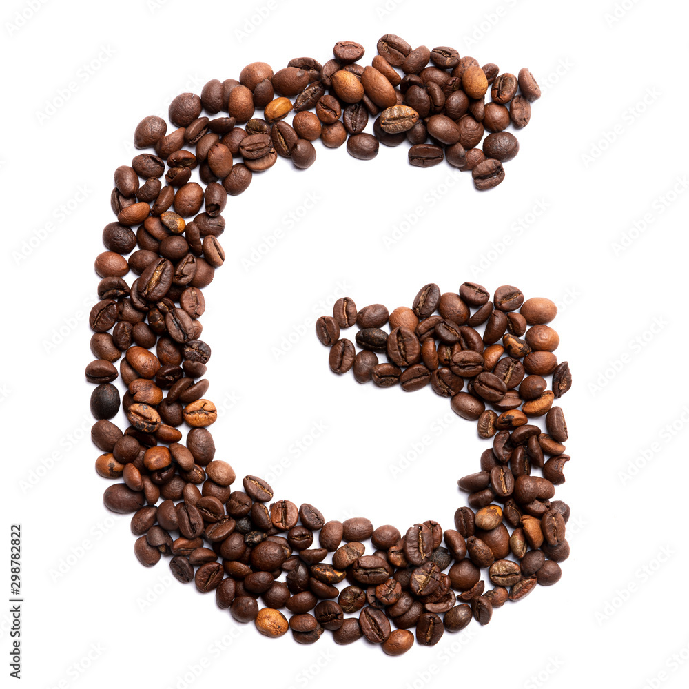 Letter G of the English alphabet of freshly roasted cocoa beans on a white isolated background. coffee pattern made from coffee beans. Font for coffein, the concept of vivacity and culture of coffee. Letter G of the English alphabet of freshly roasted cocoa beans on a white isolated background. coffee pattern made from coffee beans. Font for coffein, the concept of vivacity and culture of coffee.