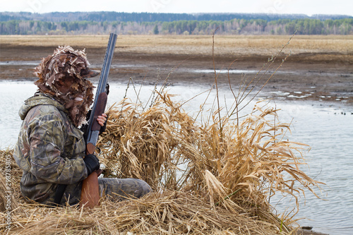 hunter gets to the duck blind photo