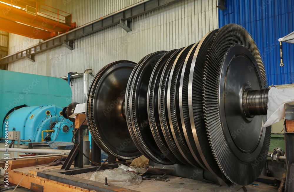 Stator generators of a big electric motor in the coal fired power plant with copy space for text. Stator generators of a big electric motor in the coal fired power plant with copy space for text.