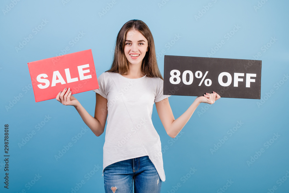 beautiful brunette woman with copyspace text 80% sale sign isolated over blue beautiful brunette woman with copyspace text 80% sale sign isolated over blue
