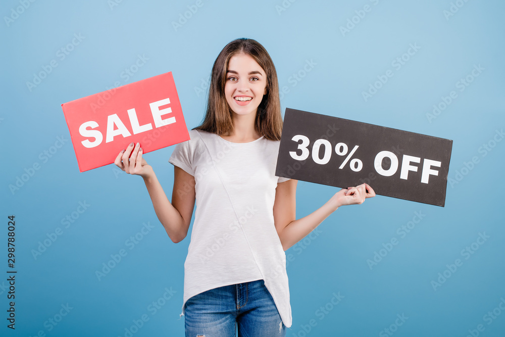 beautiful brunette woman with copyspace text 30% sale sign isolated over blue beautiful brunette woman with copyspace text 30% sale sign isolated over blue