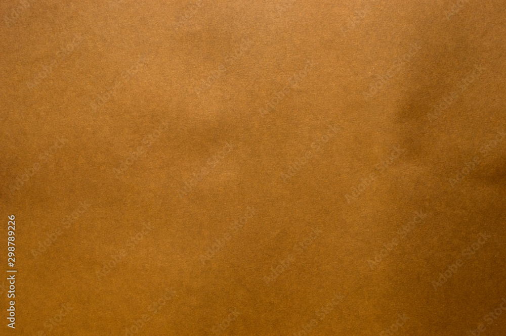 Dark brown paper surface. Suitable for use as a background. Dark brown paper surface. Suitable for use as a background.