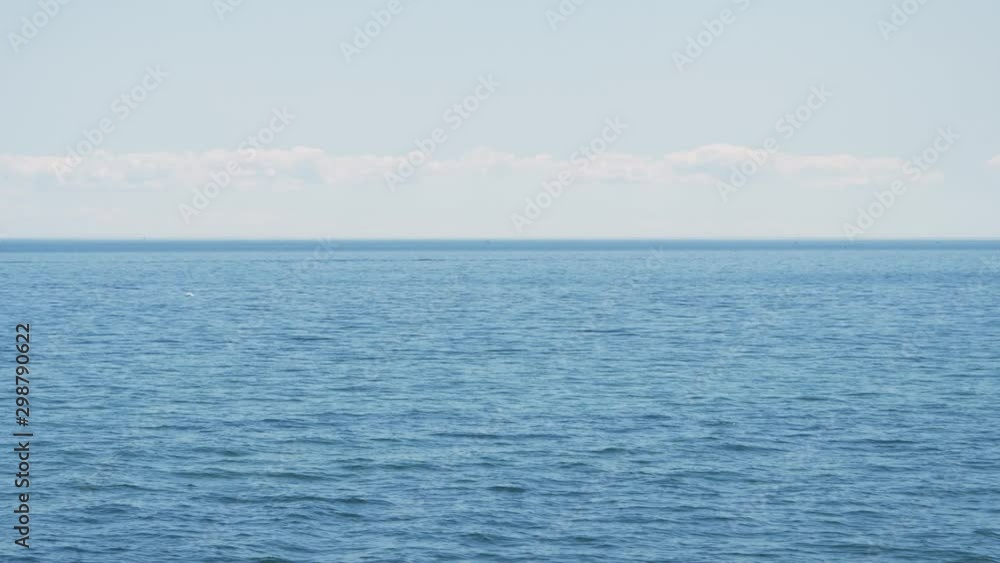 A blue & calm ocean view in slow motion A blue & calm ocean view in slow motion