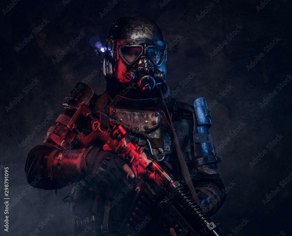 Portrait of man in amazing costume of dark apocalypse warrior with red and blue lights. Portrait of man in amazing costume of dark apocalypse warrior with red and blue lights.