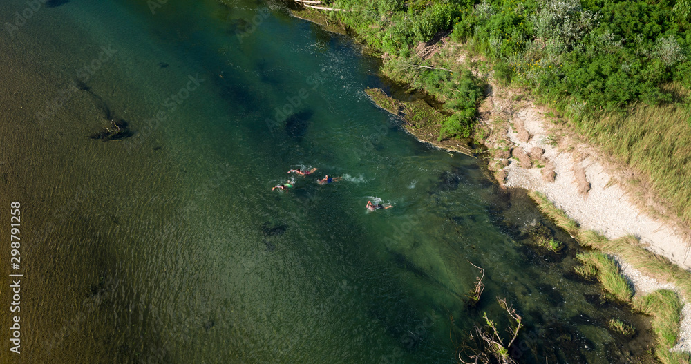 Swimmers on the Drava River, Croatia Swimmers on the Drava River, Croatia