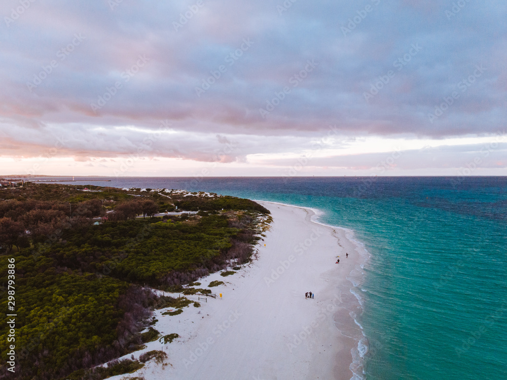 Beautiful drone shot of the ocean, beach and sand dunes covered in shrubs at Pinnaroo point, Perth, Western Australia. Beautiful drone shot of the ocean, beach and sand dunes covered in shrubs at Pinnaroo point, Perth, Western Australia.