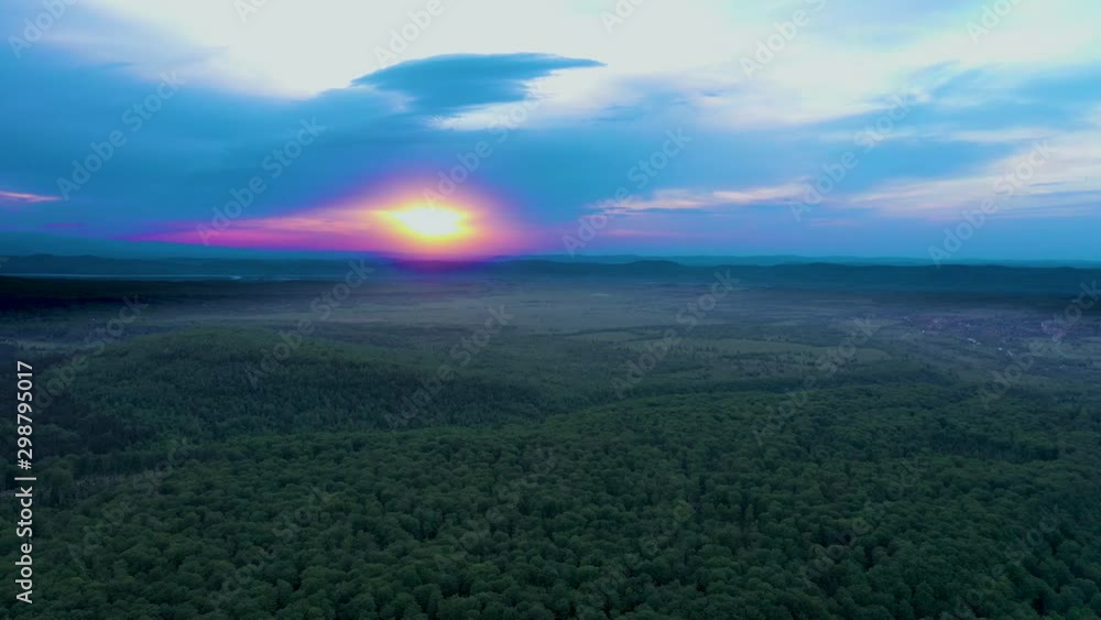 Aerial drone shot above beautiful colorful sunset over Transylvania, Romania. Fairy mystic forest trees View with Romanian mountains Negoiu landscape. Mountain Panorama Carpathian Mountains. Aerial drone shot above beautiful colorful sunset over Transylvania, Romania. Fairy mystic forest trees View with Romanian mountains Negoiu landscape. Mountain Panorama Carpathian Mountains.