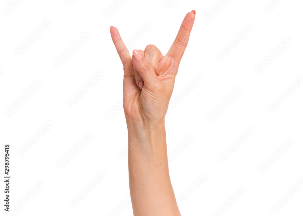 Female hand showing heavy metal Rock gesture, isolated on white background. Beautiful hand of woman with copy space. Hand pointing two fingers. Female hand showing heavy metal Rock gesture, isolated on white background. Beautiful hand of woman with copy space. Hand pointing two fingers.