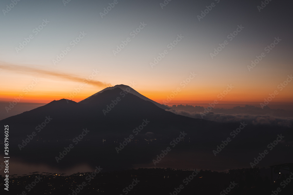 Batur volcano sunrise in the clouds Bali Indonesia