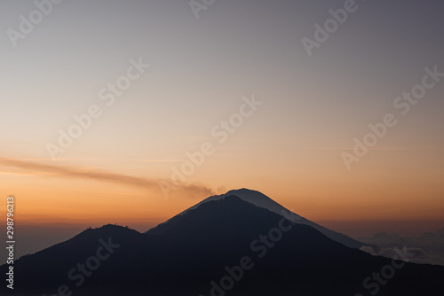 Batur volcano sunrise in the clouds Bali Indonesia