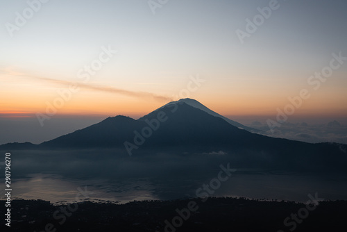 Batur volcano sunrise in the clouds Bali Indonesia