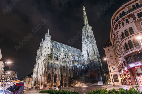 St. Stephen's Cathedral on Stefansplatz in Vienna at night with long exposure, Austria. photo