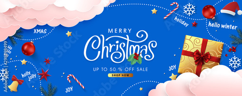 Christmas composition in paper cut style sale banner background.Merry Christmas text Calligraphic Lettering Vector illustration.