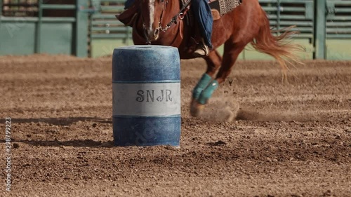Barrel Racing Horse in Slow Motion - Shallow Depth of Field. photo