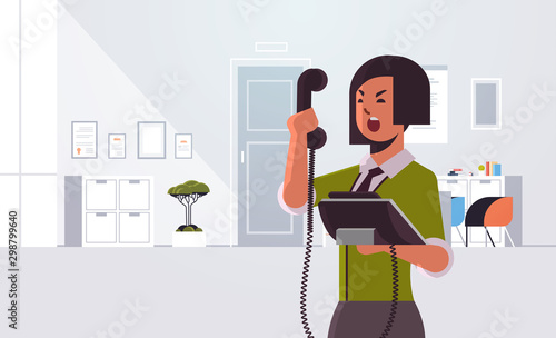 angry businesswoman screaming at phone aggressive business woman boss shouting into telephone emotional pressure conflict bad job concept modern office interior portrait flat horizontal vector